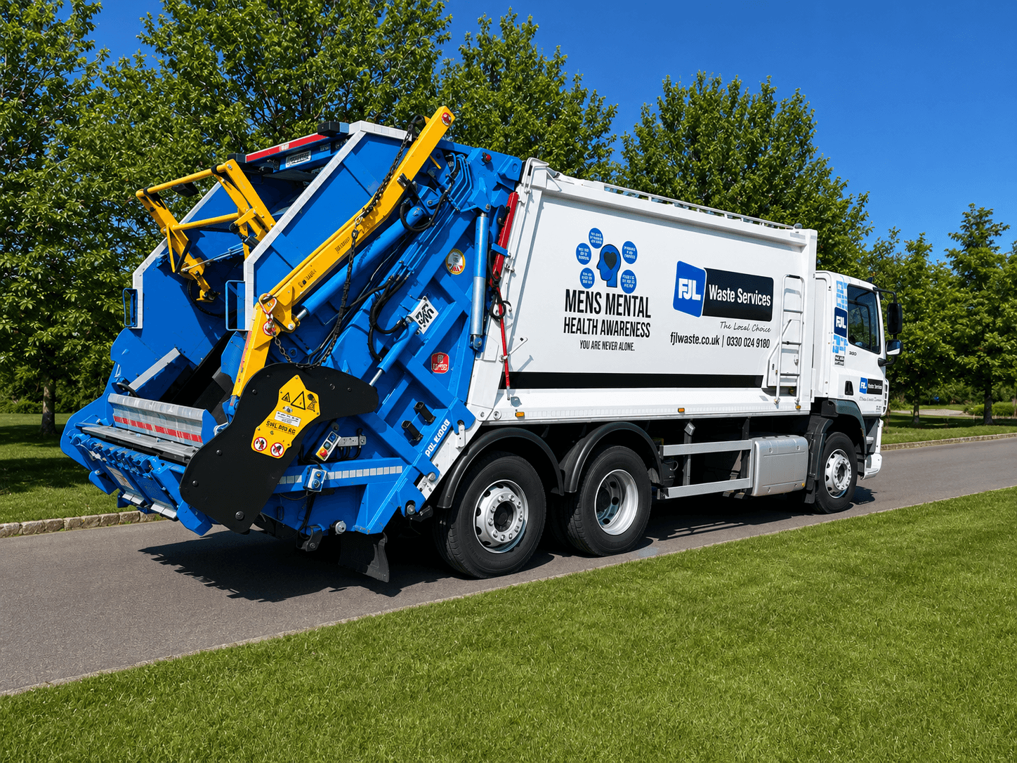FJL Waste Services lorry with Mens Mental Health Awareness livery, rear angle
